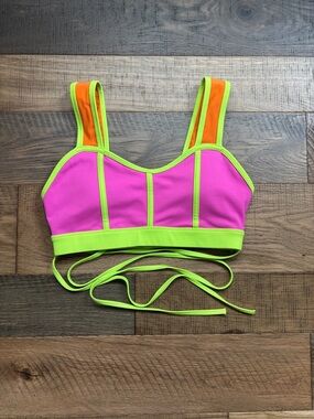 Peloton Pink and Neon Green Sports Bra with Orange Accents